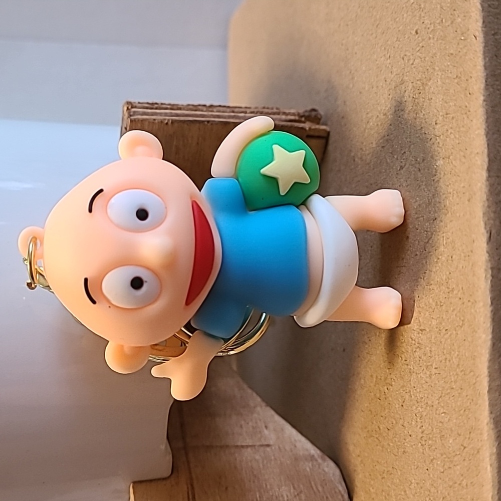 Cartoon Baby Keychain Rubber Toy Baby with Ball Keyring Backpack Charm